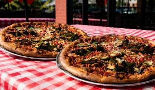 Gourmet pizza topped with vegetables